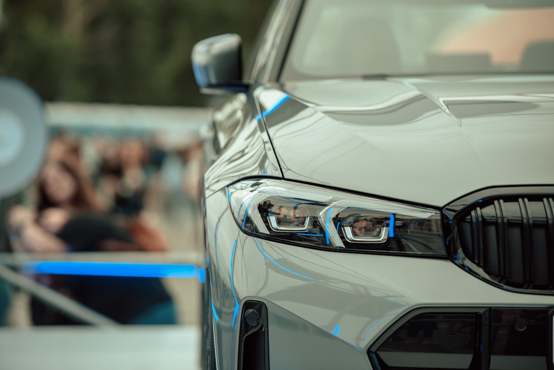Close-up of a modern white car's headlight