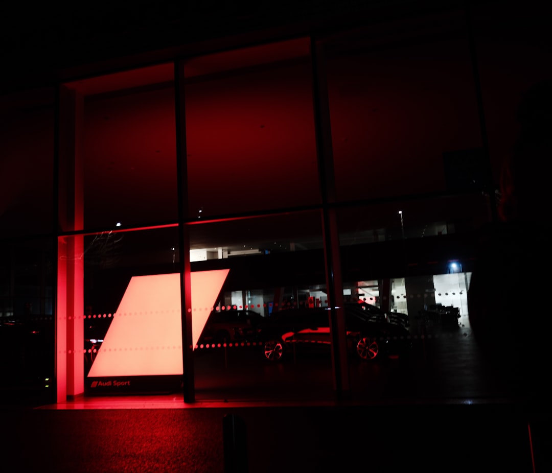 Modern building interior illuminated by red light