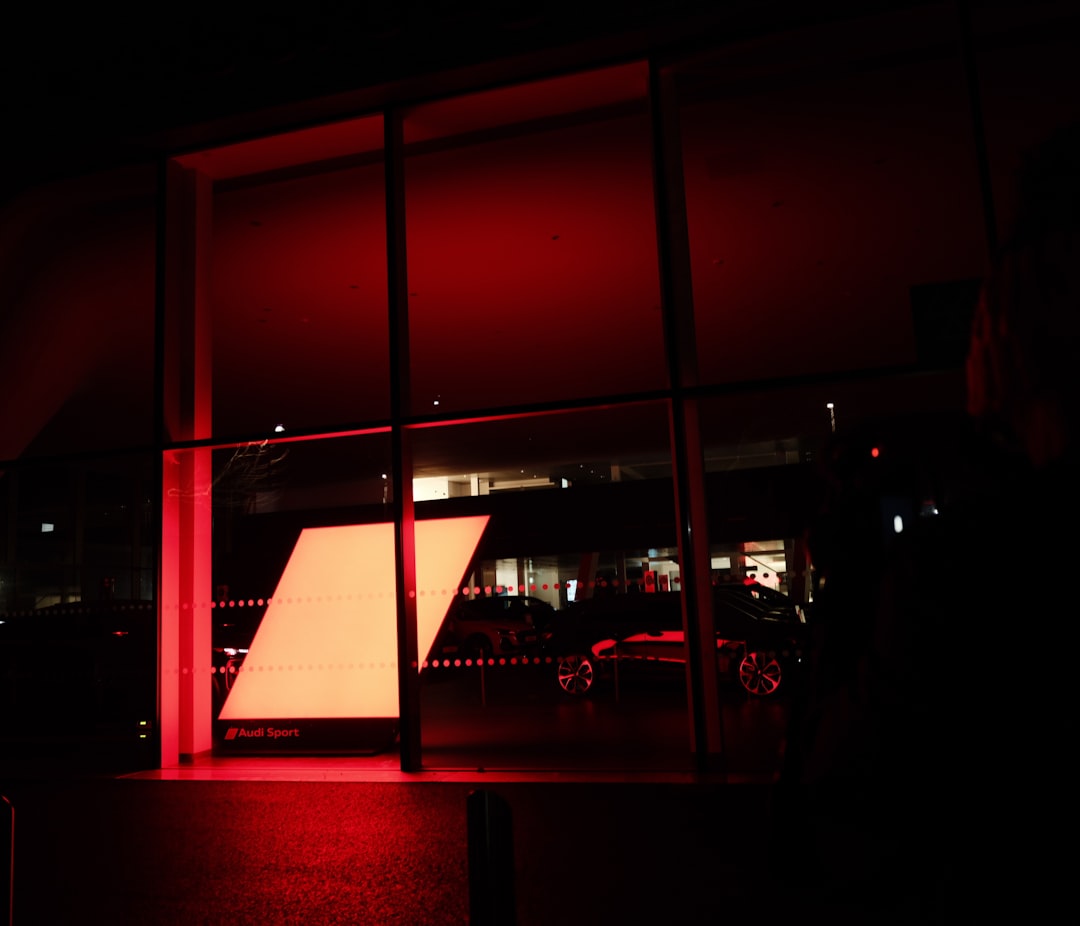Modern building with red ambient light at night