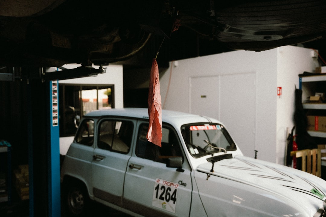 A car parked in a garage with a flag on top of it