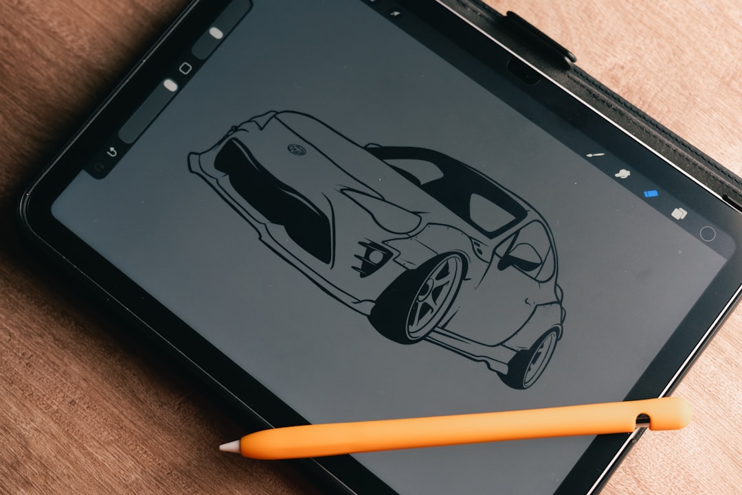 Digital sketch of a sports car on a tablet